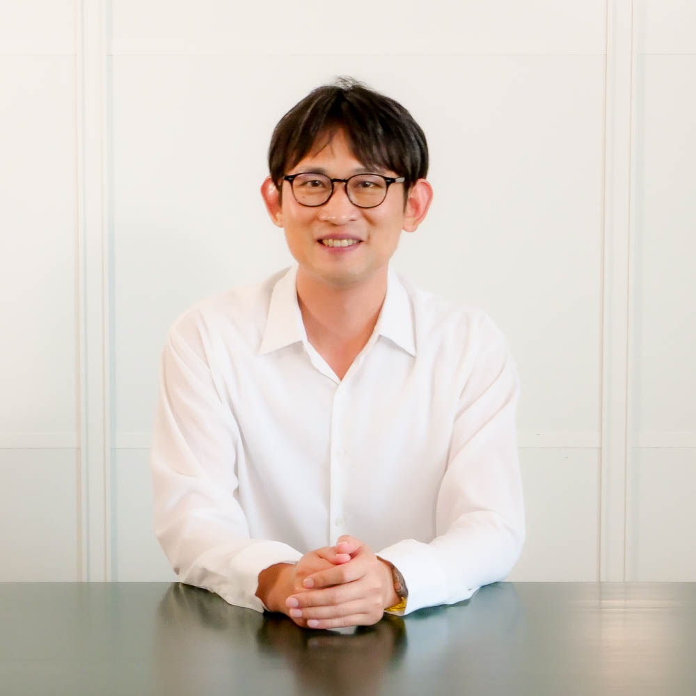 大塚 学 氏