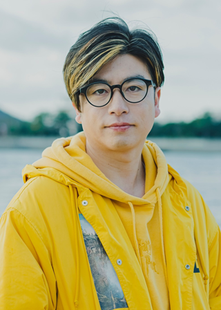 大崎 龍史 氏