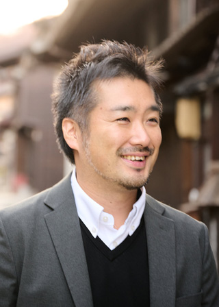 鈴木 賢治 氏